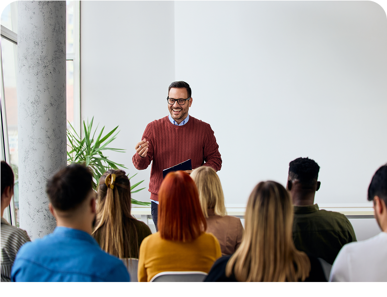 Man presenting to a small group audience.